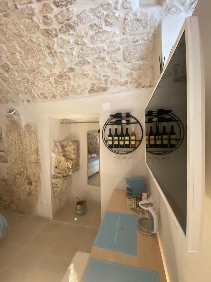 Ca Sotto L'Arco Bed & Breakfast ออสตูนี ภายนอก รูปภาพ